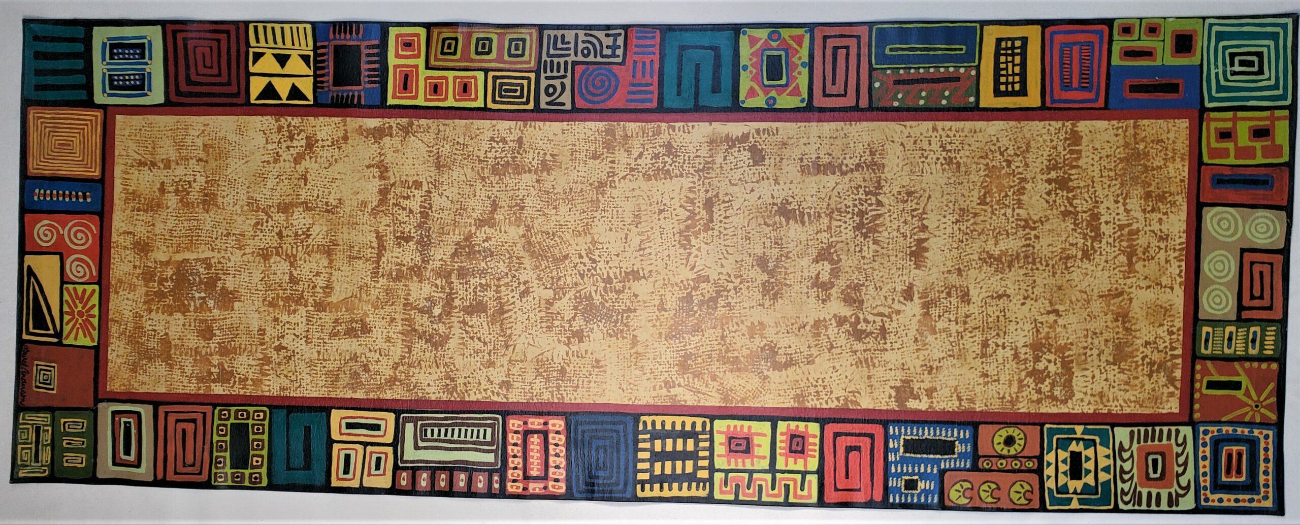 hand painted canvas runner rug with ethnic designs on border with tan jute stamp center